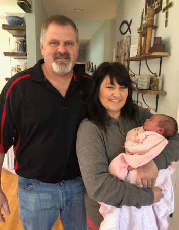 team Jim-and-Wife-with-Grandchild